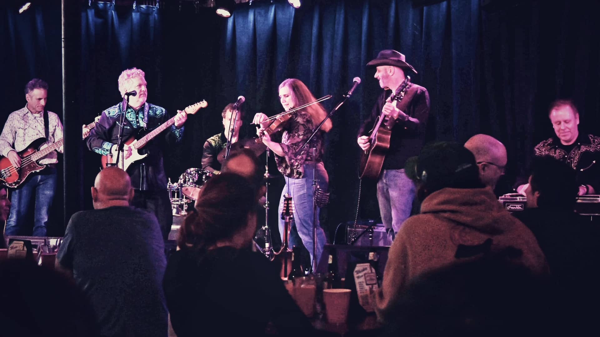 Promotional image ď's Country Holiday Extravaganza on December 19, 2025, at Carol's Pub.