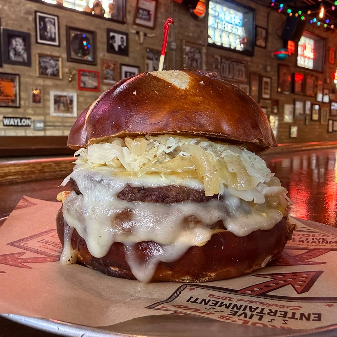 Promotional image for October's Burger of the Month at Carol's Pub: The Wiesen Burger